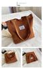 Bolso de gran capacidad, otoño e invierno 2023, nuevo bolso de mujer, bolso de lona, bolso de hombro, bolso de mano informal, sencillo y portátil.