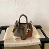 Bolso de mano transfronterizo, elegante bolso tipo cubo para mujer, nuevo bolso de hombro estilo coreano 2026, minimalista y de moda, bolso cruzado de nicho