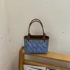 Bolsa de balde de nicho de alta qualidade para mulheres, nova bolsa versátil de outono de 2026, bolsa transversal popular para ir ao trabalho