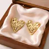 Aretes de Acero Inoxidable Día de San Valentín Aretes de Amor Tartán Versátil Moda Aretes de Lujo Ligero Aretes de Acero de Titanio con Forma de Corazón Transfronterizo