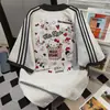 Camiseta de Algodón 100% Puro con Gatito Lindo y Tres Rayas, Cuello Redondo, Manga Corta para Hombres y Mujeres, Tops de Verano Sueltos y Versátiles para Parejas Ins