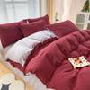Oferta especial estilo luxo leve transmissão ao vivo conjunto de quatro peças cor sólida sono nu nórdico simples escovado amigo da pele fábrica de Nantong roupa de cama