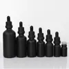 Venta al por mayor del fabricante Botella gotero de vidrio negro mate portátil de 10 ml Botella de aceite esencial 30 ml Botella vacía rellenable a prueba de luz para muestras cosméticas