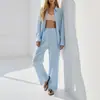 Roupas femininas transfronteiriças europeias e americanas de 2026: conjunto casual de duas peças: camisa de manga comprida com gola, solta, e calça de cintura alta, plissada, de perna larga
