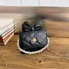 Moda Nueva Primavera/Verano 2026 Elegante Acolchada Cadena Perla Versátil Infantil Bolso de Hombro Cruzado Pequeño Cuadrado