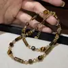 Collar Elegante de Gama Alta con Cuentas de Piedra Ojo de Tigre Blanco Retro Maillard Nuevo Diseño de Nicho Collar de Cristal para Mujer