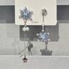 "La primera nieve" aretes simples retro de otoño e invierno azul blanco piedra copo de nieve borla alto sentido del temperamento nicho aretes versátiles