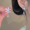 Nuevos Pendientes Asimétricos de Copo de Nieve para Otoño e Invierno, Pendientes de Clip para Mujer, Lujo Ligero, Elegantes, de Gama Alta, Pendientes Exquisitos Versátiles sin Agujeros en las Orejas