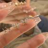 ¡Cuatro piezas! El dueño del lugar super recomendado! Conjunto de Cuatro Piezas de Aretes Mariposa Love Tendencia ins Lujo Ligero Nicho Aretes Calientes