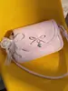 Bolso cruzado de hombro para mujer 2026 transfronterizo, nuevo y elegante, estilo nicho, con lazo, bolso de mano pequeño cuadrado de lunares de alta gama