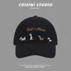 Gorra de béisbol bordada con letra de cachorro estilo coreano para mujer, adecuada para salidas de primavera y verano, con visera ancha para protección solar y sombra facial, versátil para estudiantes de primaria