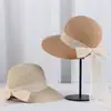 Sombrero de Paja con Cinta de Nuevo Temperamento al por Mayor para Mujer, Sombrilla de Verano y Protección Solar, Ala Ancha que Muestra la Cara, Pequeño, Moda, Viaje, Sombrero de Playa