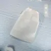 Bolsas para zapatos de tela no tejida al por mayor, bolsas de almacenamiento, bolsas para zapatos, bolsas con cordón para artículos pequeños de viaje, bolsas de embalaje de tela no tejida