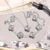 Juego de joyería de trébol de cuatro hojas, acero de titanio, oro real de 18 quilates, pulsera grabada, collar, pendientes, juego de tres piezas de trébol de cuatro hojas, entrega transfronteriza