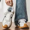 Zapatos de hombre estilo alemán, nueva colección de primavera 2026, zapatillas deportivas casual, antideslizantes, estilo Forrest Gump, versátiles para adolescentes, zapatillas de lona con suela blanda