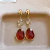 Pendientes de borla con carcasa de madera marrón transfronterizos europeos y americanos, pendientes de estilo vintage Maillard, pendientes de mujer de lujo ligero de alta gama