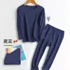 Invierno 2025 Nuevo Traje de Ropa Interior para Hombres y Mujeres Ropa y Pantalones de Otoño Sin Marcas Elástico Forrado de Felpa Base Cálida