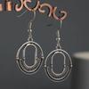 Europa y Estados Unidos comercio electrónico transfronterizo nuevos aretes de mujer populares explosiones AliExpress retro redondos creativos aretes de dama