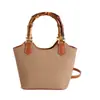 Nova bolsa de mão feminina estilosa e elegante 2026, bolsa tote tipo balde fashion, bolsa de palha feminina da moda, bolsa transversal