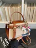 Bolso de Mano Pequeño de Bloques de Color a la Moda para Mujer 2026 Nuevo Estilo Bolso de Hombro Elegante con Textura Bolso Cruzado de Moda