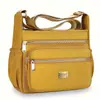 Bolso bandolera transfronterizo nuevo de gran capacidad para mujer, hecho de tela Oxford, con múltiples compartimentos para almacenamiento, un elegante bolso de hombro adecuado para ir al trabajo y diseñado para madres de mediana edad