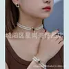 Design de nicho de luxo leve doce legal colar de garota popular feminino vento frio simples temperamento alta sensação moda conjunto atacado