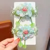 Diadema de tela para el pelo de fresa color macarrón para niñas, accesorio diario para el peinado con borlas y cuentas de colores, diadema suave y linda para niñas