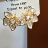 Pendientes de Metal con Forma de Corazón y Flor de Circonita Estilo Francés Super Hada con Acabado de Alta Gama, Diseño de Nicho Versátil, Pendientes Elegantes de Lujo Ligero