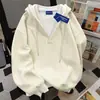 Sudadera con capucha de estilo coreano, sencilla, de dos piezas simuladas, para hombre y mujer, nueva para otoño e invierno 2026, jersey de color liso, holgada, para parejas, moderna
