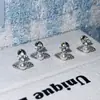 Pendientes de Perla Brillante Saturno Moda y Versatilidad Nuevos Pendientes Pequeños para un Look Femenino y Elegante