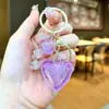 Llavero Creativo de Color UV Galvanizado Corazón de Amor Moderno y Tendencia Colgante Pequeño para Bolso Exquisito Lindo Regalo para Pareja Venta al por Mayor