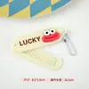 Nuevo Peine Plegable Lindo de Dibujos Animados Mini Peine para Estudiantes con Cadena Colgante Peine de Bolsillo Portátil Peine de Peluquería Venta al por Mayor