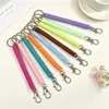 Juego de llaveros y tarjetas con cuerda de resorte de plástico, accesorios para bolsas, cordón elástico de color antipérdida, venta al por mayor