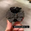 Elegante clipe de diamante com laço de celebridade da internet feminino clipe de meio de cabeça versátil novo clipe de tubarão acessório de cabelo simples