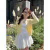 Cárdigan de punto amarillo para mujer, modelo nuevo 2026, extremadamente elegante, atuendo de principios de otoño estilo coreano, top, suéter de otoño e invierno, abrigo corto