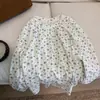 Estampado floral otoño nuevo estilo fresco y simple borde biselado botón de concha manga tres cuartos algodón puro básico holgado camisa top para mujer transfronterizo