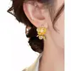 Aretes de Flores con Textura Metálica para Mujer Aretes de Diseño Nicho 2025 Nuevo Estilo Caliente Aretes Únicos de Gama Alta para Mujer