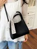 Bolsa de Mão de Luxo Transfronteiriça 2024 Novo Estilo Padrão Lichia Bolsa Feminina de Luxo Leve Moderna Versátil Ombro Transversal Bolsa Saco