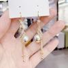 Pendientes vintage con borlas de perlas de pavo real para mujer, largos, con diseño de fénix, nuevos y populares, con temperamento rojo de red, combinables con todo, al por mayor