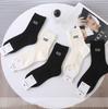 Nuevos Calcetines de Miu Estilo para Mujer Primavera y Otoño, de Media Pantorrilla, Doble Puño, Color Sólido, Calcetines Deportivos Simples, Productos Europeos de Nicho