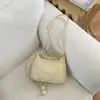 Bolsa transversal versátil de moda 2026 transfronteiriça, bolsa de ombro super popular de nicho, bolsa saco mais vendida para mulheres