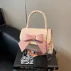 Bolsa de Mão com Laço de Verão 2025 Nova Bolsa de Nicho Feminina Doce Versátil Bolsa de Ombro com Corrente Pequena Bolsa Quadrada