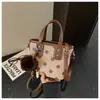 Bolso de mano de lunares de moda para mujer, nuevo bolso cubo de estilo coreano de nicho para el día a día, bolso de hombro y cruzado