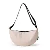 Bolso de hombro minimalista de moda estilo japonés 2026 nuevo versátil color sólido bolsa de albóndiga casual deportiva bandolera patchwork para mujer
