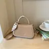 Bolso pequeño transfronterizo 2026 nuevo super popular para mujer, bolso de hombro de alta gama, bolso cruzado cuadrado pequeño