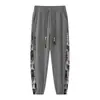 Pantalones Jogger de Marca de Moda Estampado de Otoño Pantalones Casuales Nuevos para Exteriores Sueltos Versátiles Pantalones para Hombre Verano