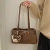Bolso de hombro texturizado de nuevo estilo para invierno 2026, bolso moderno y con personalidad, bolso casual de diseño exclusivo para mujer.