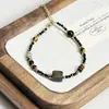 Pulseira de Concha Natural Cor Maillard Pedra Olho de Tigre Design Nicho Pulseira Simples Pulseira de Miçangas de Arroz Importadas