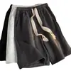 Shorts esportivos masculinos e femininos iguais verão Novo solto shorts de basquete cor sólida versátil cordão calça de moletom casual