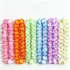 Variedad hawaiana de venta cruzada más vendida de tela de poliéster, guirnaldas coloridas, 6.5 cm, 24 pares de pétalos artificiales